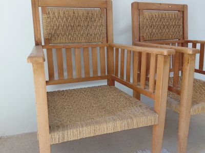 2 antique wooden armchairs with woven seats