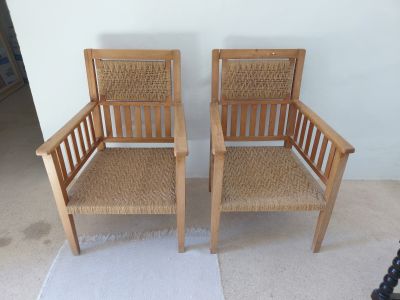 2 antique wooden armchairs with woven seats