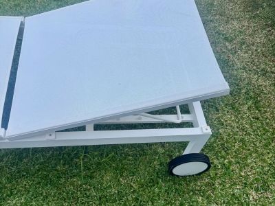 4 white aluminum sun loungers with wheels
