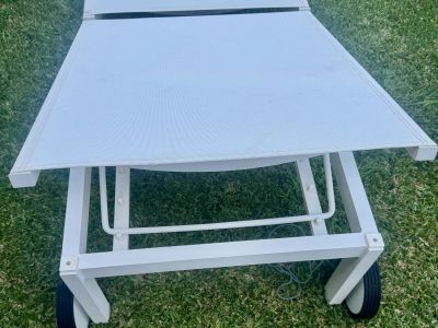 4 white aluminum sun loungers with wheels