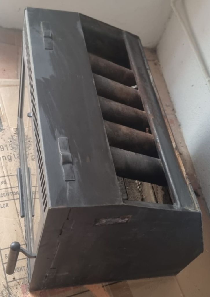 Ausgezeichneter *Spartherm*. Holzkamineinsatz aus Gusseisen.