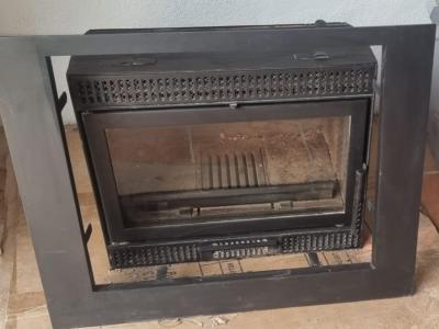 Ausgezeichneter *Spartherm*. Holzkamineinsatz aus Gusseisen.