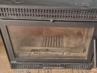 Ausgezeichneter *Spartherm*. Holzkamineinsatz aus Gusseisen.