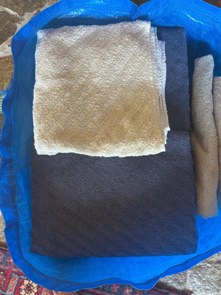 Toallas de ducha y de mano descartadas
