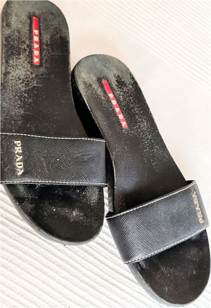 Women's black vintage Prada slides, size 38