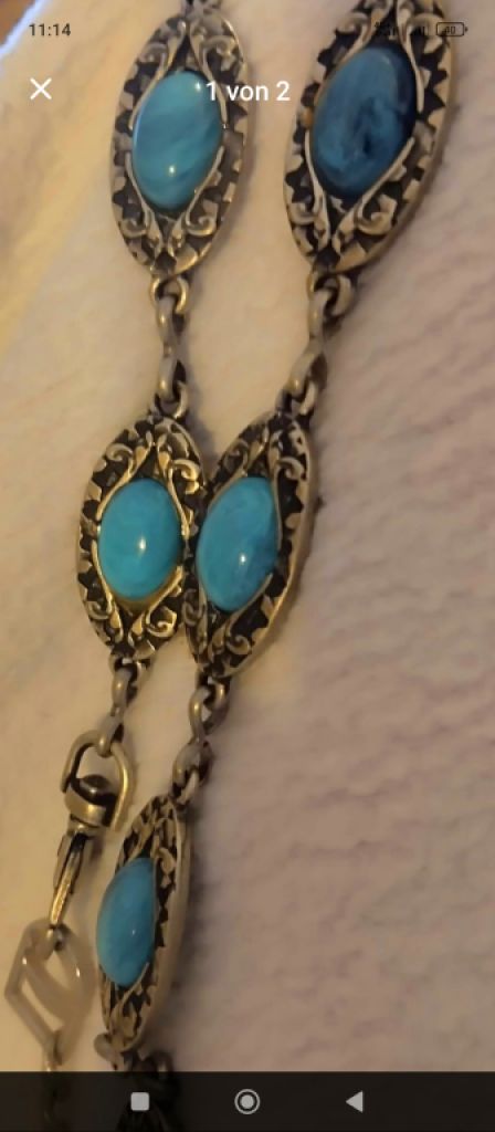 Women's belt with turquoise-colored stones