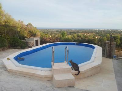 Chale a nivel del suelo con piscina, calefacción y vistas al mar cerca de Son Carrió -- CH 63