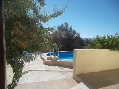 Chale a nivel del suelo con piscina, calefacción y vistas al mar cerca de Son Carrió -- CH 63