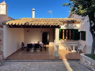 Ground-level chalet with garden, holiday license and sea view in Cala Figuera -- CH 48