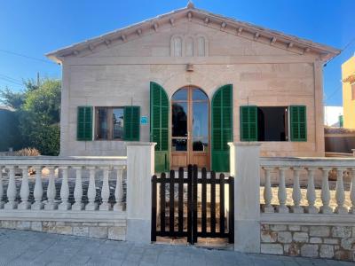 Ground-level chalet with garden, holiday license and sea view in Cala Figuera -- CH 48