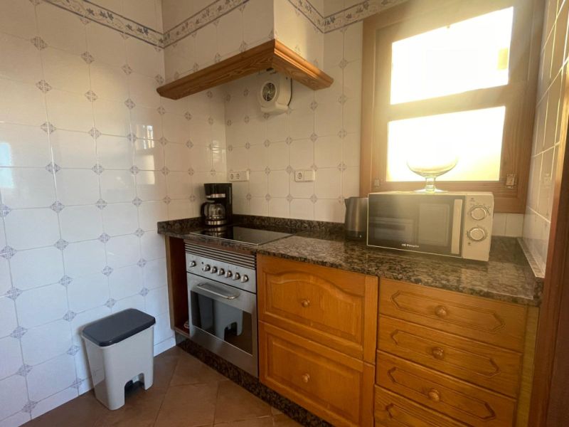 Ground-level chalet with garden, holiday license and sea view in Cala Figuera -- CH 48
