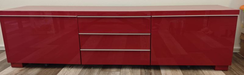 Elegant red high-gloss sideboard