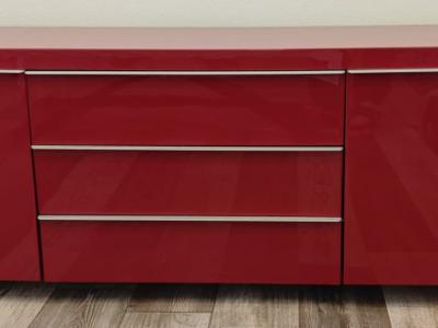 Elegant red high-gloss sideboard