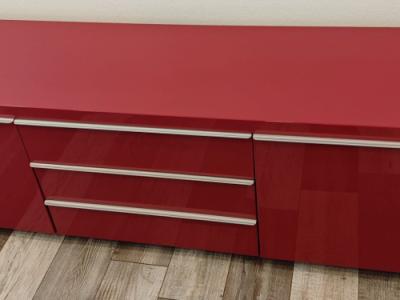Elegant red high-gloss sideboard