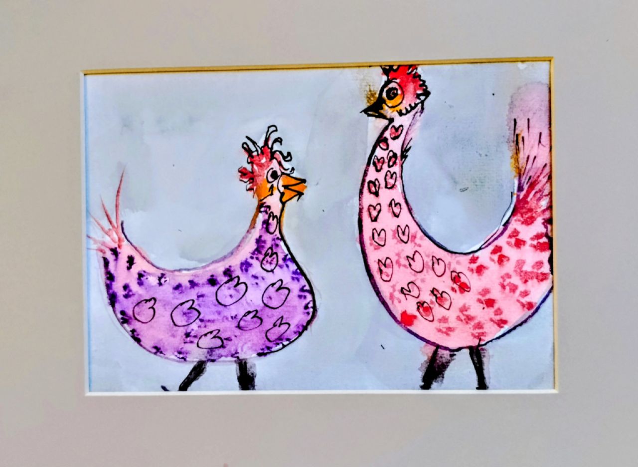 Un gallo y una gallina enamorados