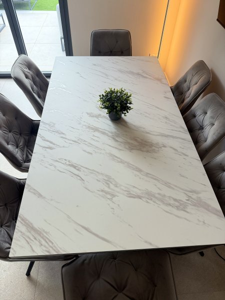 Extendable ceramic dining table + 8 velvet swivel chairs