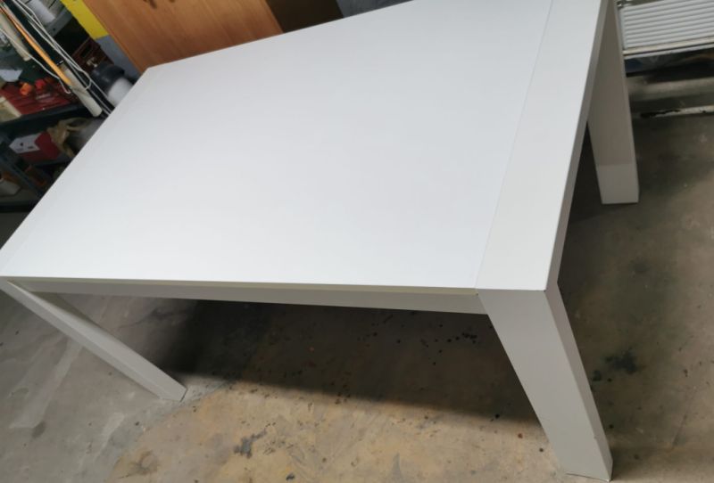 White solid wood extendable dining table