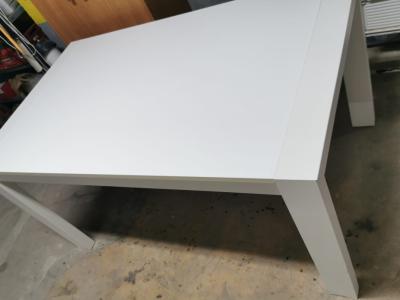 White solid wood extendable dining table