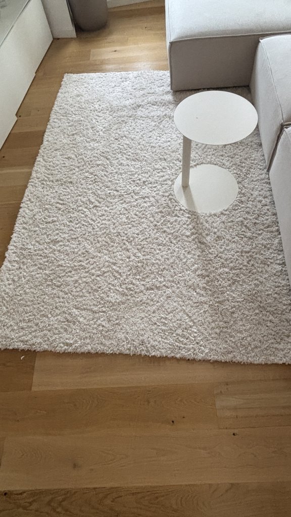 Fluffy IKEA high-pile rug in cream white