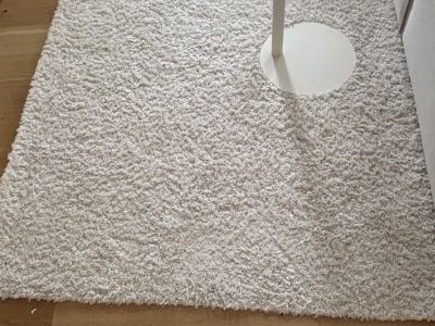 Fluffy IKEA high-pile rug in cream white