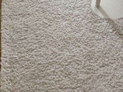 Fluffy IKEA high-pile rug in cream white