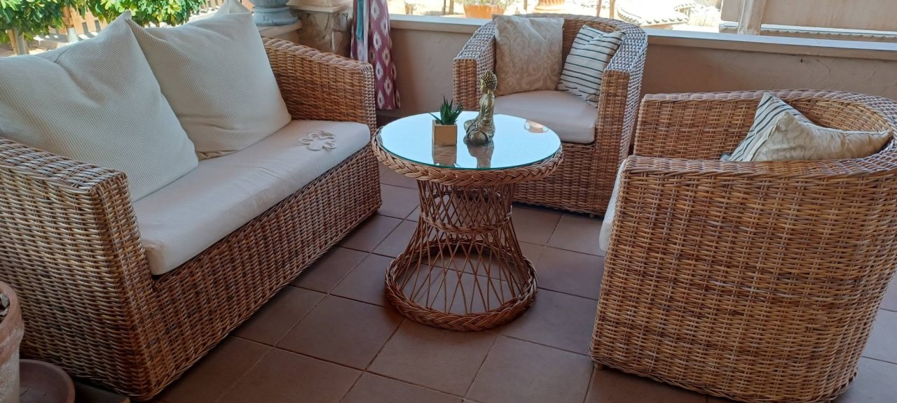 Natural rattan garden sofa.