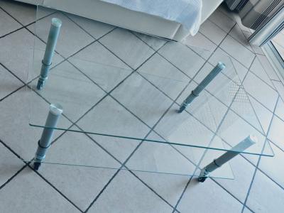 Glass coffee table with wheels