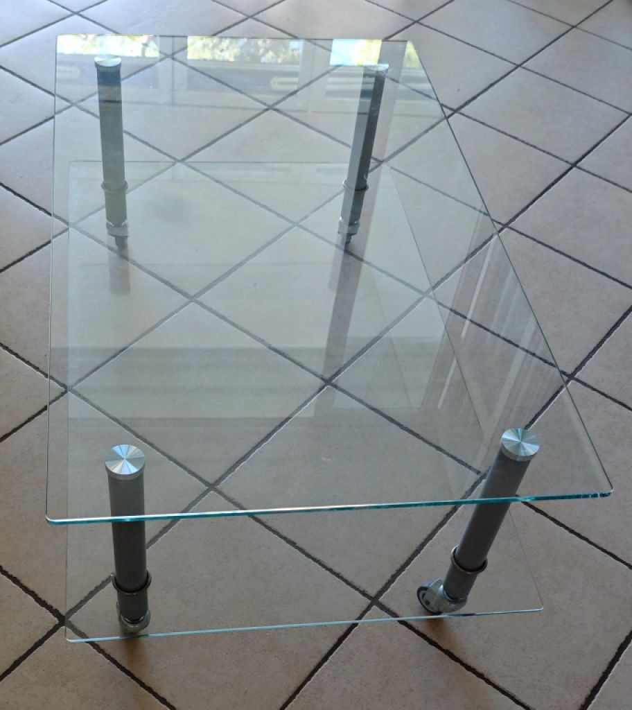 Glass coffee table with wheels