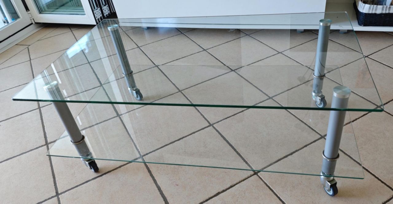 Glass coffee table with wheels