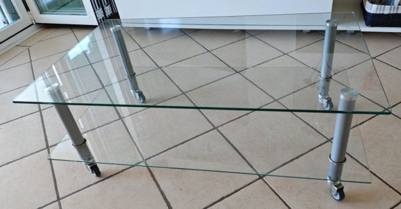 Glass coffee table with wheels