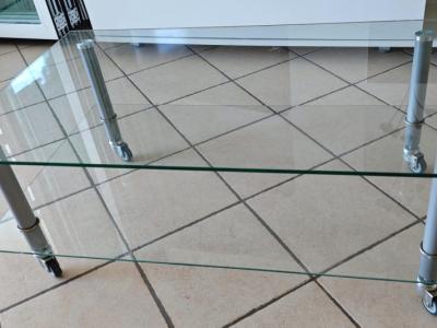 Glass coffee table with wheels