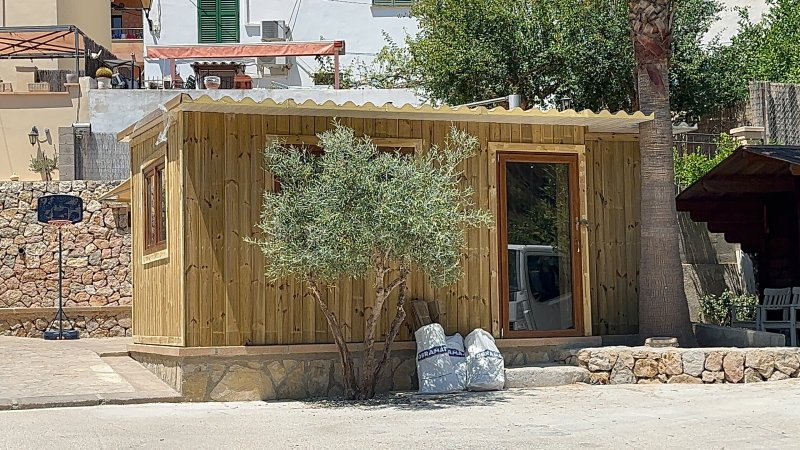 Wooden houses and garden sheds