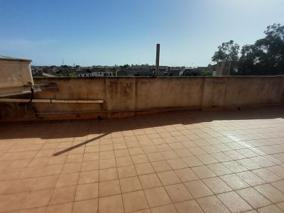 Inversión: Casa de pueblo de 3 plantas con patio y terrazas en Ses Salines -- L 35