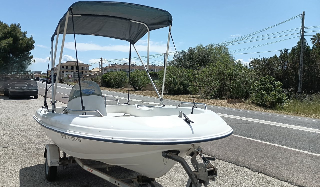 Jenneau Chantier console boat 4m 15HP outboard with trailer