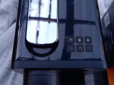 Coffee capsules with machine