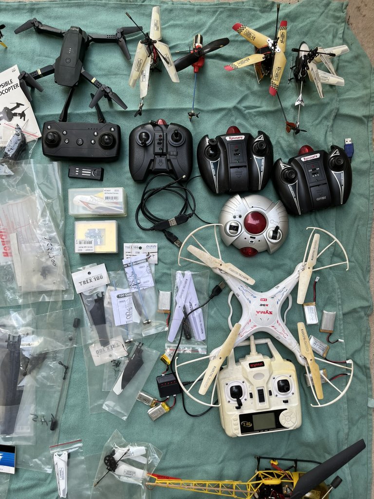 Lot of Helicopters & Drones with Many Spare Parts for Sale!