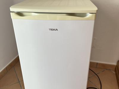 Fridge with freezer compartment