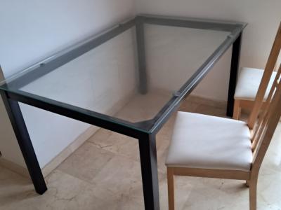 Metal table with glass top