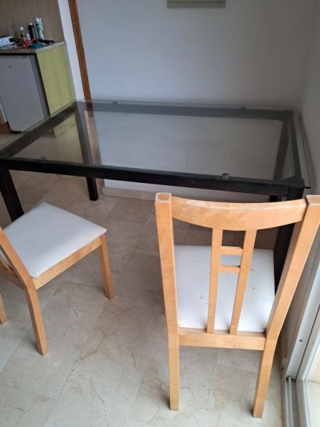 Metal table with glass top