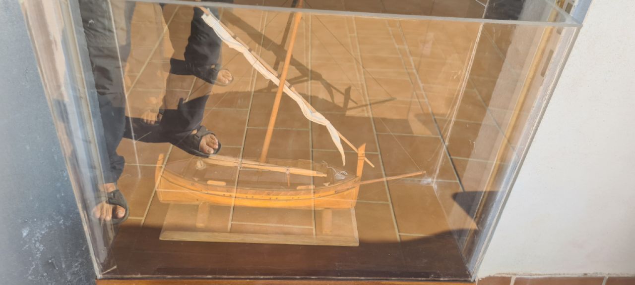 Model ship in display case