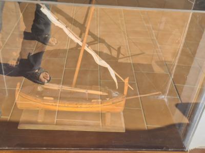 Model ship in display case