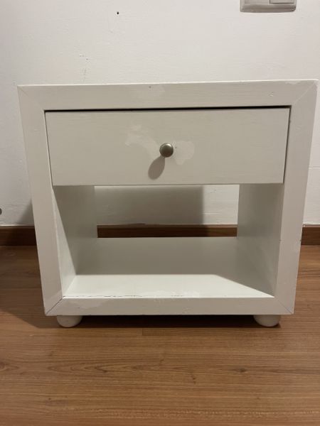 White wooden bedside table with drawer