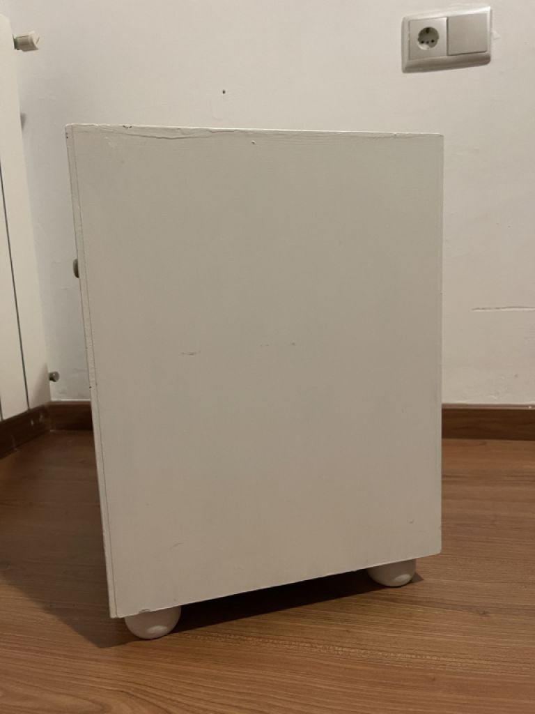 White wooden bedside table with drawer
