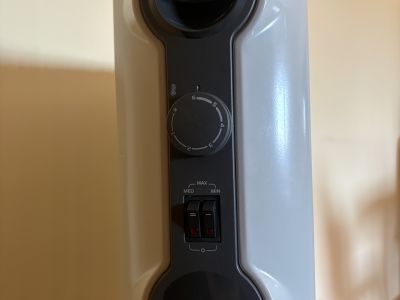 Oil-filled electric heater by DeLonghi