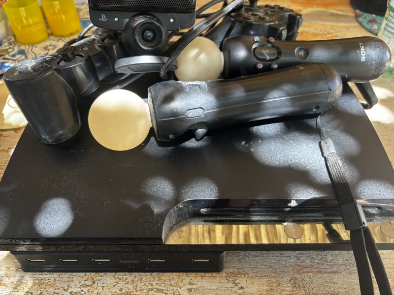 PlayStation 3 + PS Move + 14 Spiele