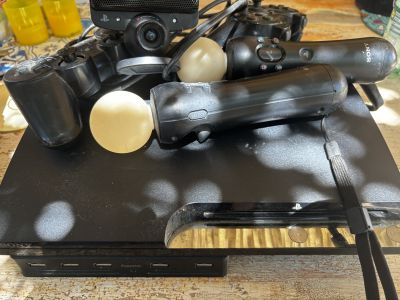 PlayStation 3 + PS Move + 14 Spiele