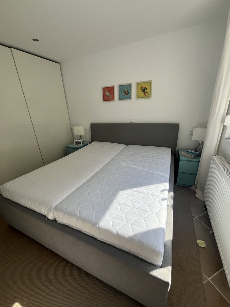 Gray upholstered bed