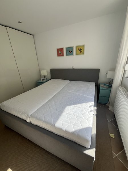 Gray upholstered bed