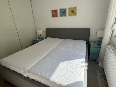 Gray upholstered bed