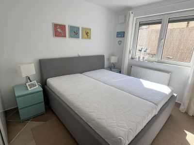 Gray upholstered bed
